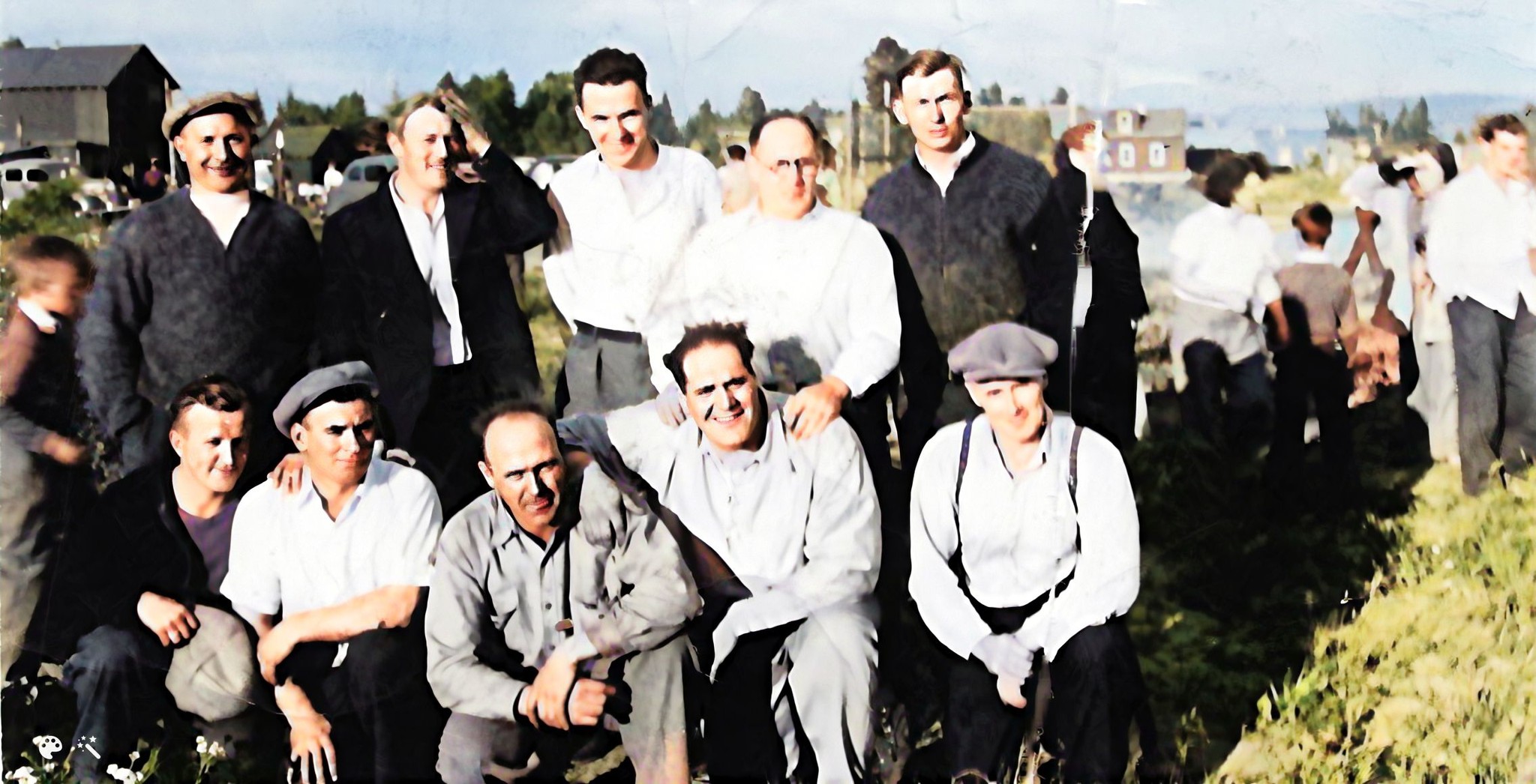 a photo of a group of men. Henry Bazelot has been identified in the back row on the left.