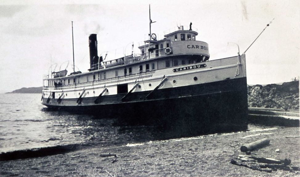 A photo of the Caribou ship docked in Michipicoten Harbour.