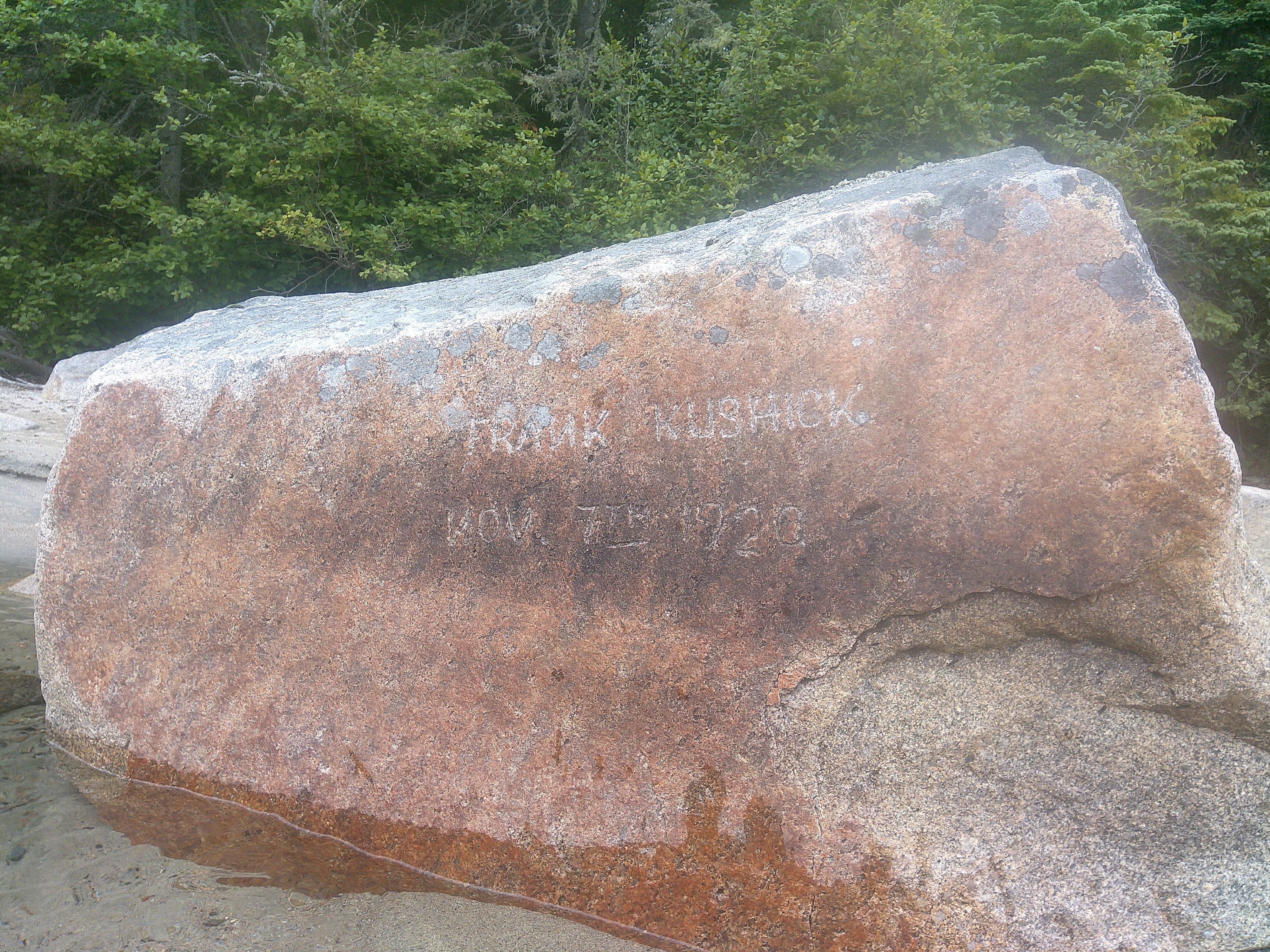 A photo of a rock that Frank Kurshick carved on November 7, 1920. Located at Pipe River.