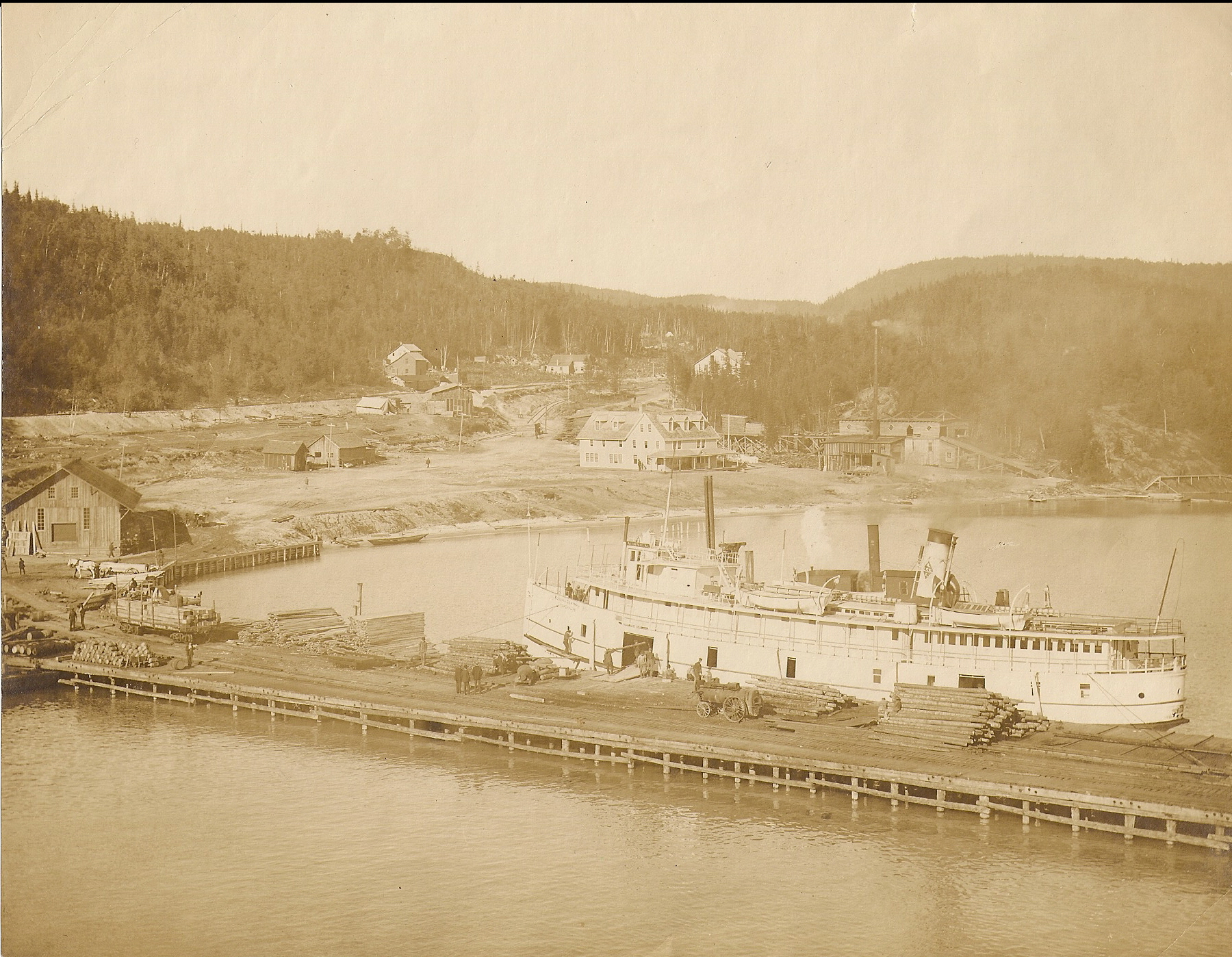 A photo of the ship, Minnie M docked in Michipicoten Harbour in 1908.